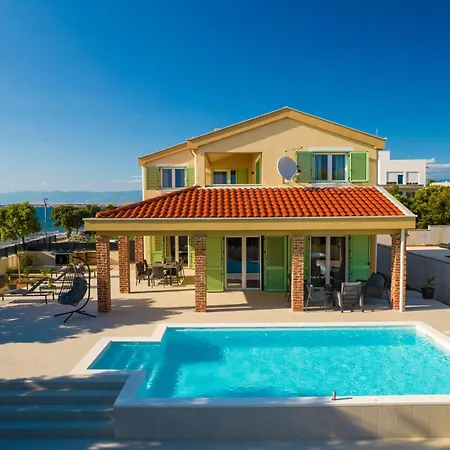 Front With Heated Pool, Jacuzzi, Fantastic View, The Sound Of The Waves - By Traveler Tourist Agency Krk Id 2404 * Privlaka (Zadar)
