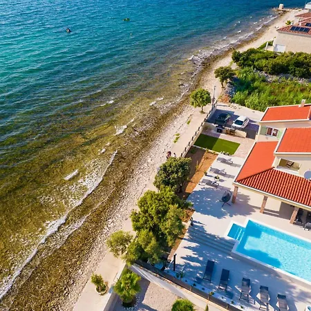 Front With Heated Pool, Jacuzzi, Fantastic View, The Sound Of The Waves - By Traveler Tourist Agency Krk Id 2404 * Privlaka (Zadar)
