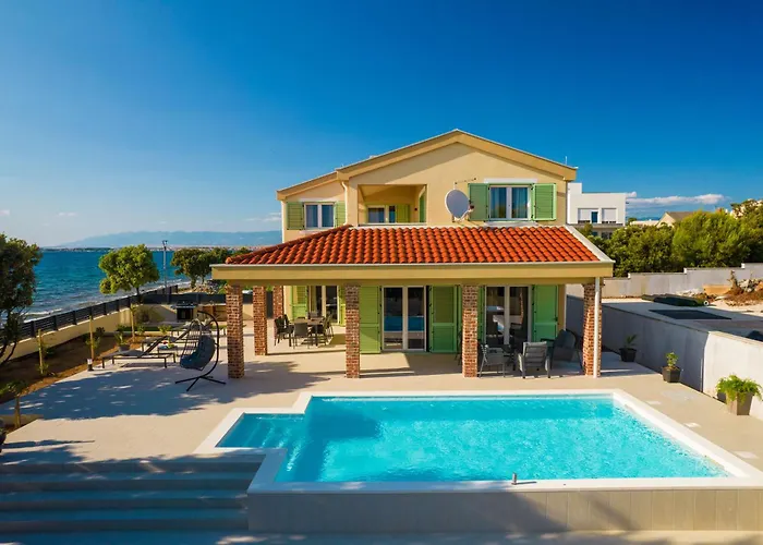 Front With Heated Pool, Jacuzzi, Fantastic View, The Sound Of The Waves - By Traveler Tourist Agency Krk Id 2404 * Privlaka (Zadar)