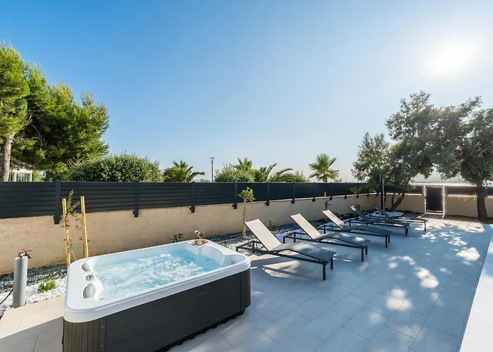 Villa Front With Heated Pool, Jacuzzi, Fantastic View, The Sound Of The Waves - By Traveler Tourist Agency Krk Id 2404 Privlaka (Zadar)