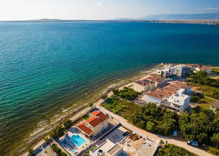 Front With Heated Pool, Jacuzzi, Fantastic View, The Sound Of The Waves - By Traveler Tourist Agency Krk Id 2404 * Privlaka (Zadar)