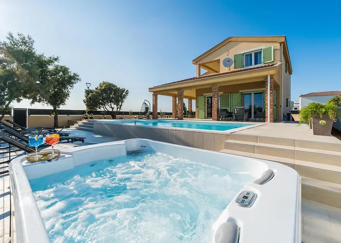 Front With Heated Pool, Jacuzzi, Fantastic View, The Sound Of The Waves - By Traveler Tourist Agency Krk Id 2404 * Privlaka (Zadar)